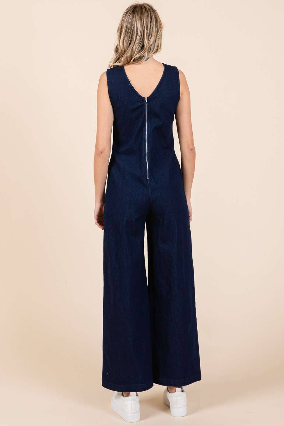 The DENIM SLEEVELESS V-NECK JUMPSUIT